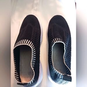 Stylish Black and White Slip-On Sneakers